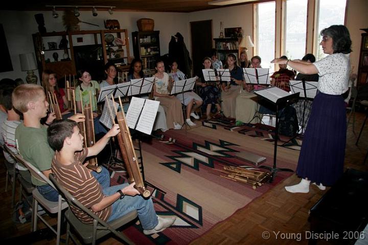 24 The first classes of the day are the Outreach classes. Each class prepared something for Sabbath. Here the Angklung choir is practicing their music.