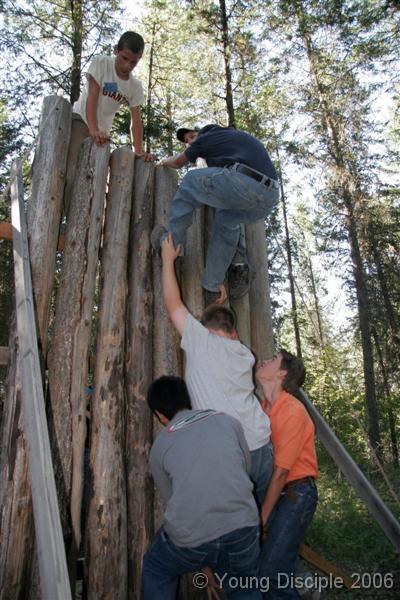 48 It takes teamwork to get everyone over this wall.